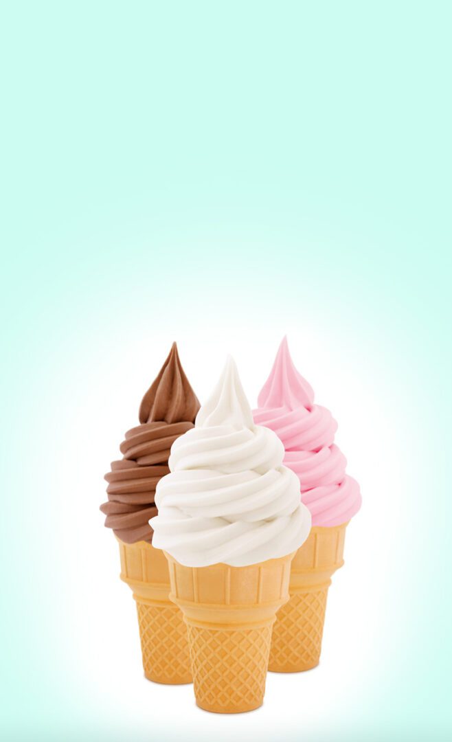 Three ice cream cones with different flavors on them.