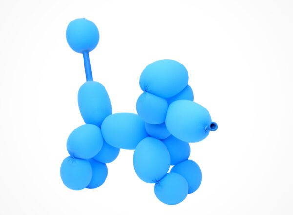 A blue balloon dog is standing up in the shape of a letter.