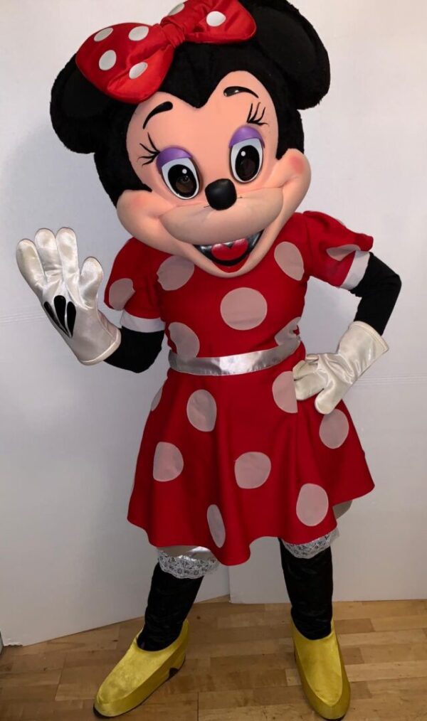 A minnie mouse character in a red dress