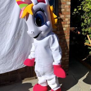 A person in a unicorn costume standing outside.